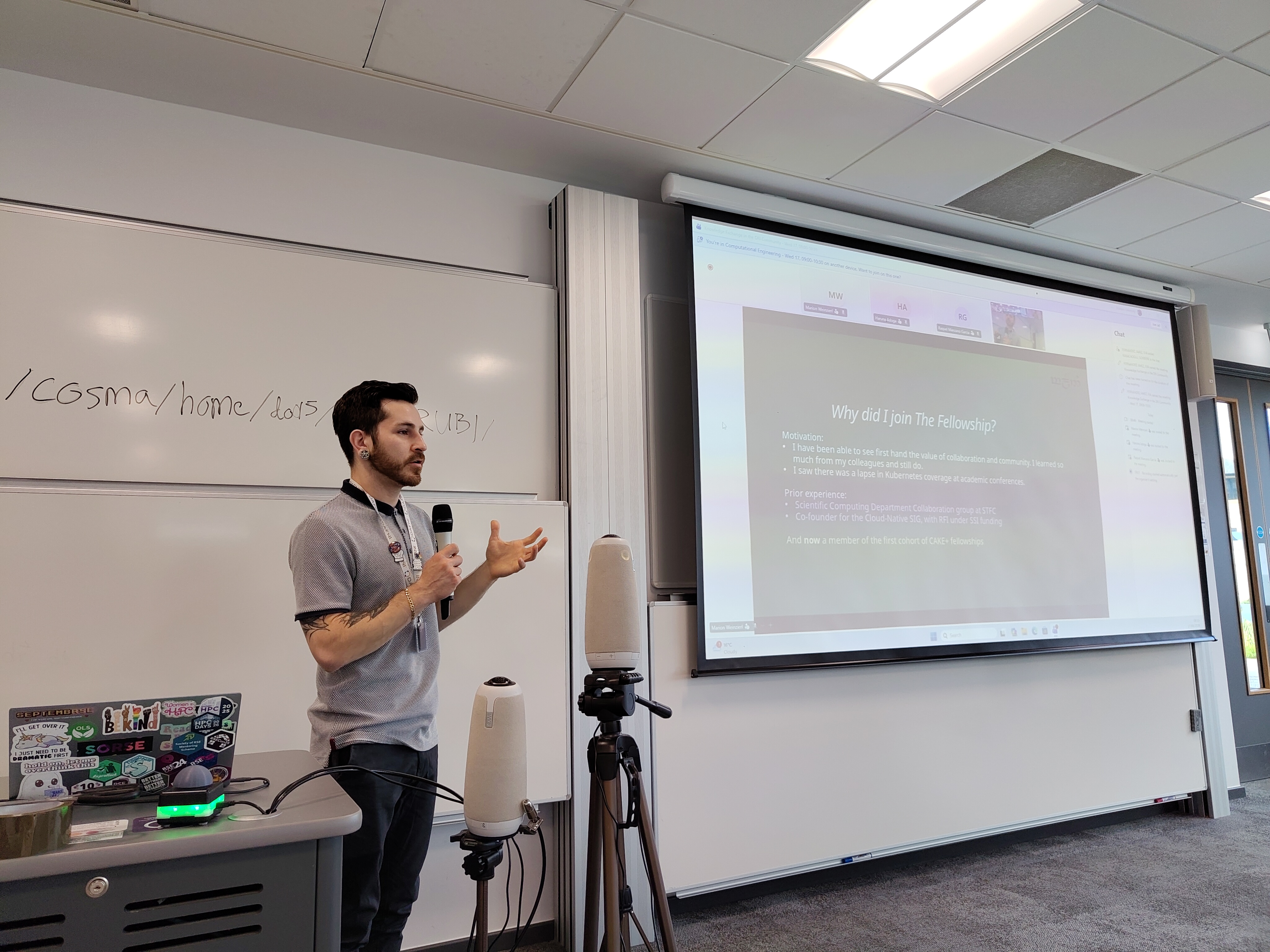 A still of Lewis talking about the Kubernetes CAKE fellowship at Durham HPC days.